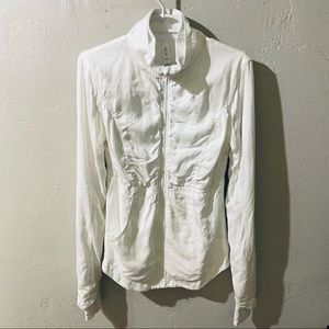 Like new, Lululemon zip up jacket, thumb hole cut out. Size 8. Super cute!